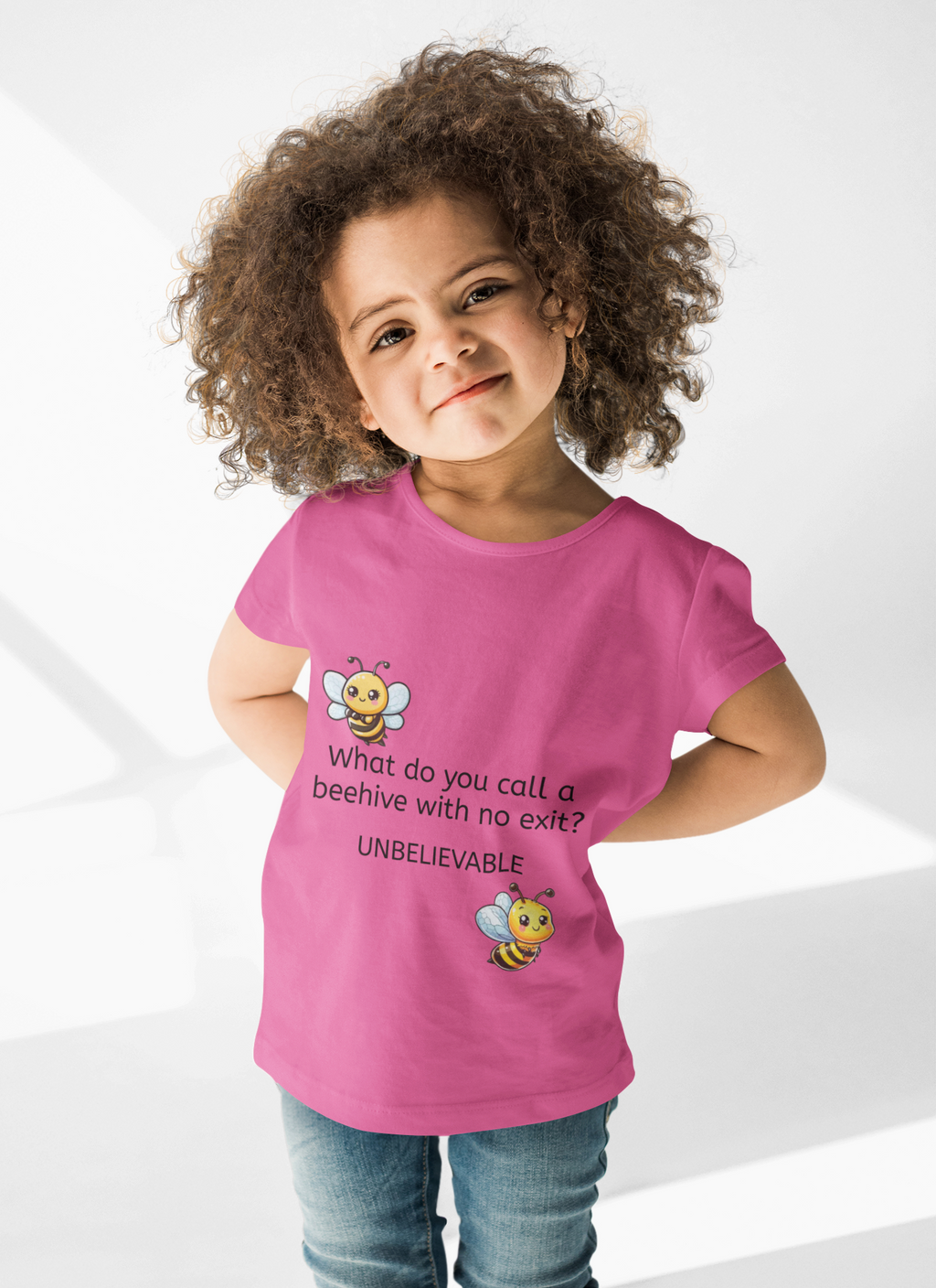 Kids Bee Pun T‑Shirt – "What do you call a beehive with no exit? UNBELIEVABLE"